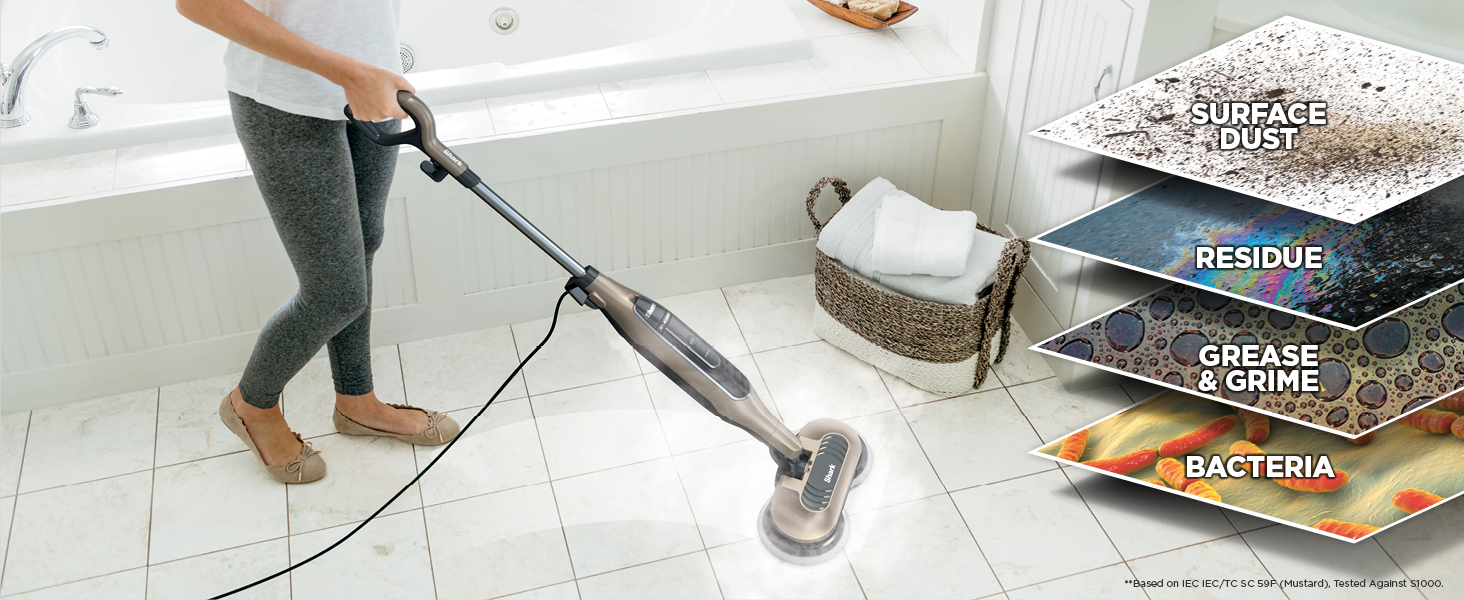 steam mop on bathroom floor for dust residue grease and bacteria